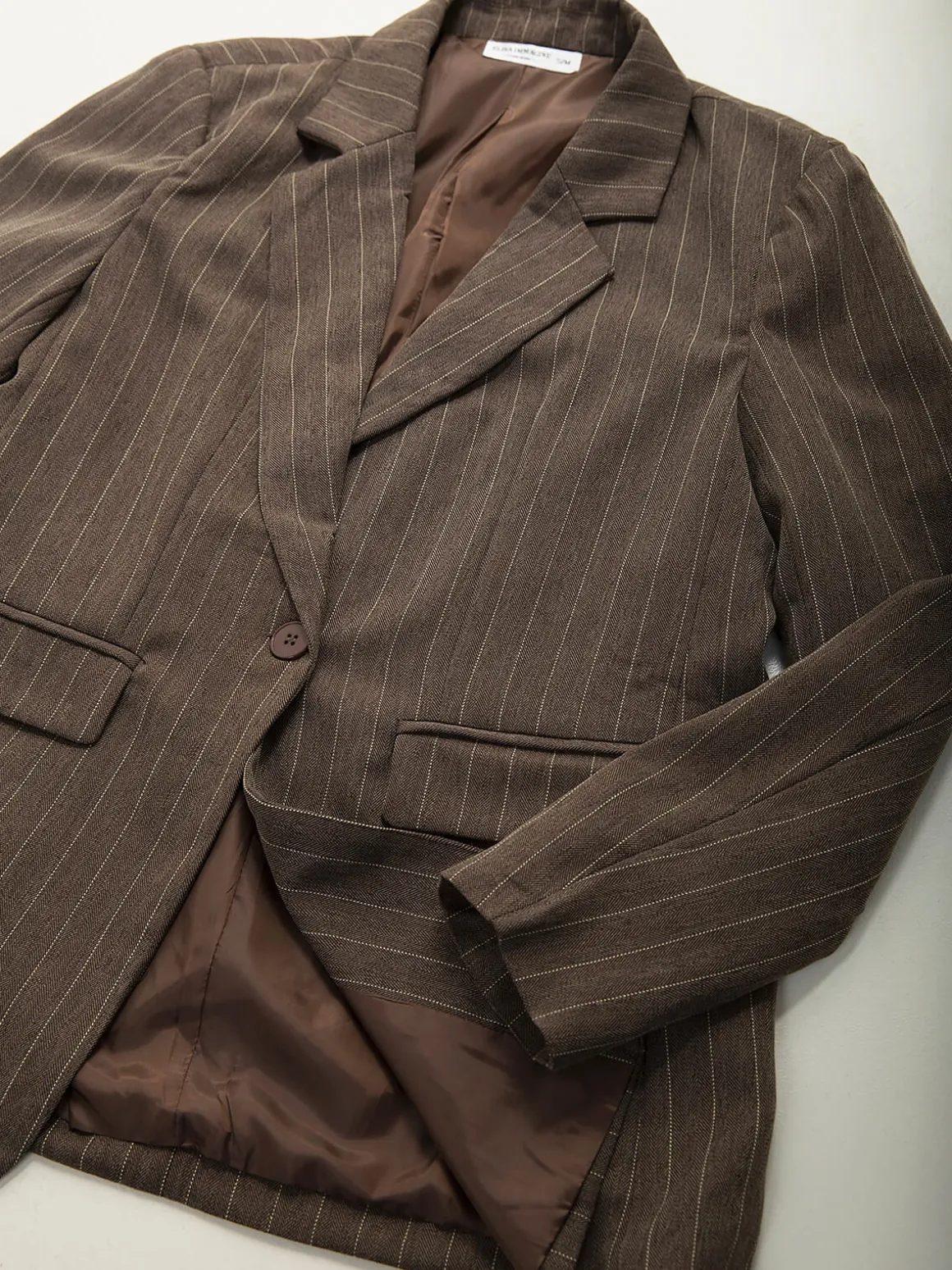 Blazer com riscas diplomáticas