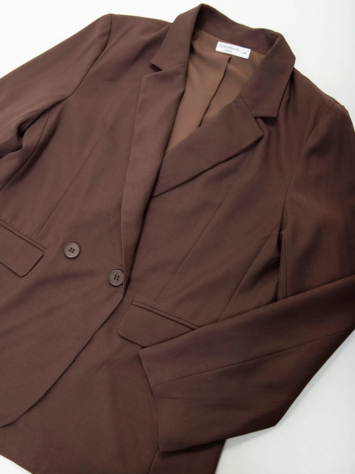 Blazer de alfaiataria com botões