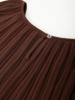 Blusa plissada com mangas largas