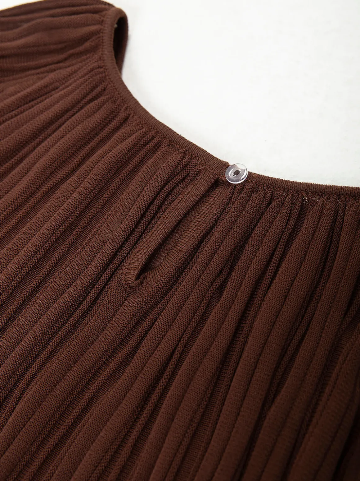 Blusa plissada com mangas largas