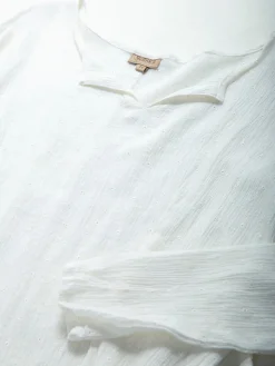 Blusa texturizada manga comprida