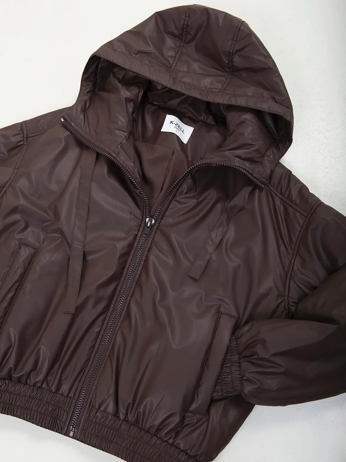 Blusão acolchoado efeito pele com capuz