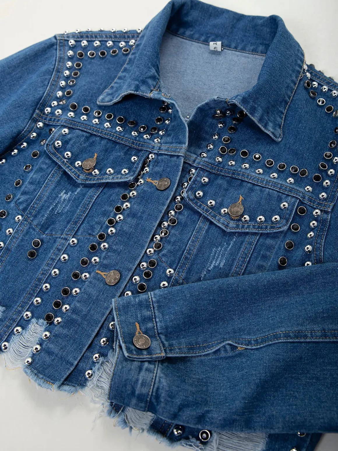 Blusão ganga com tachas