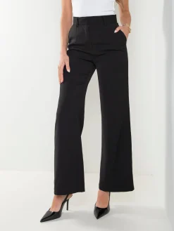 Calças alfaiataria com bolsos