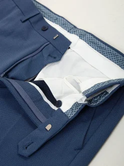 Calças chino azuis com micro padrão