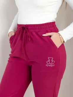 Calças com bordado urso