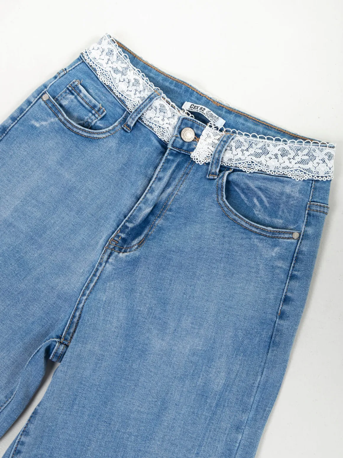 Calças de ganga largas com renda