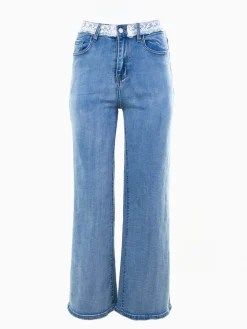 Calças de ganga largas com renda