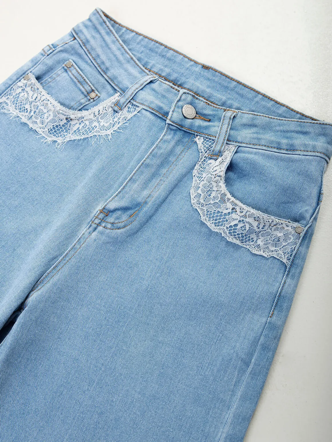 Calças de ganga wide leg com renda