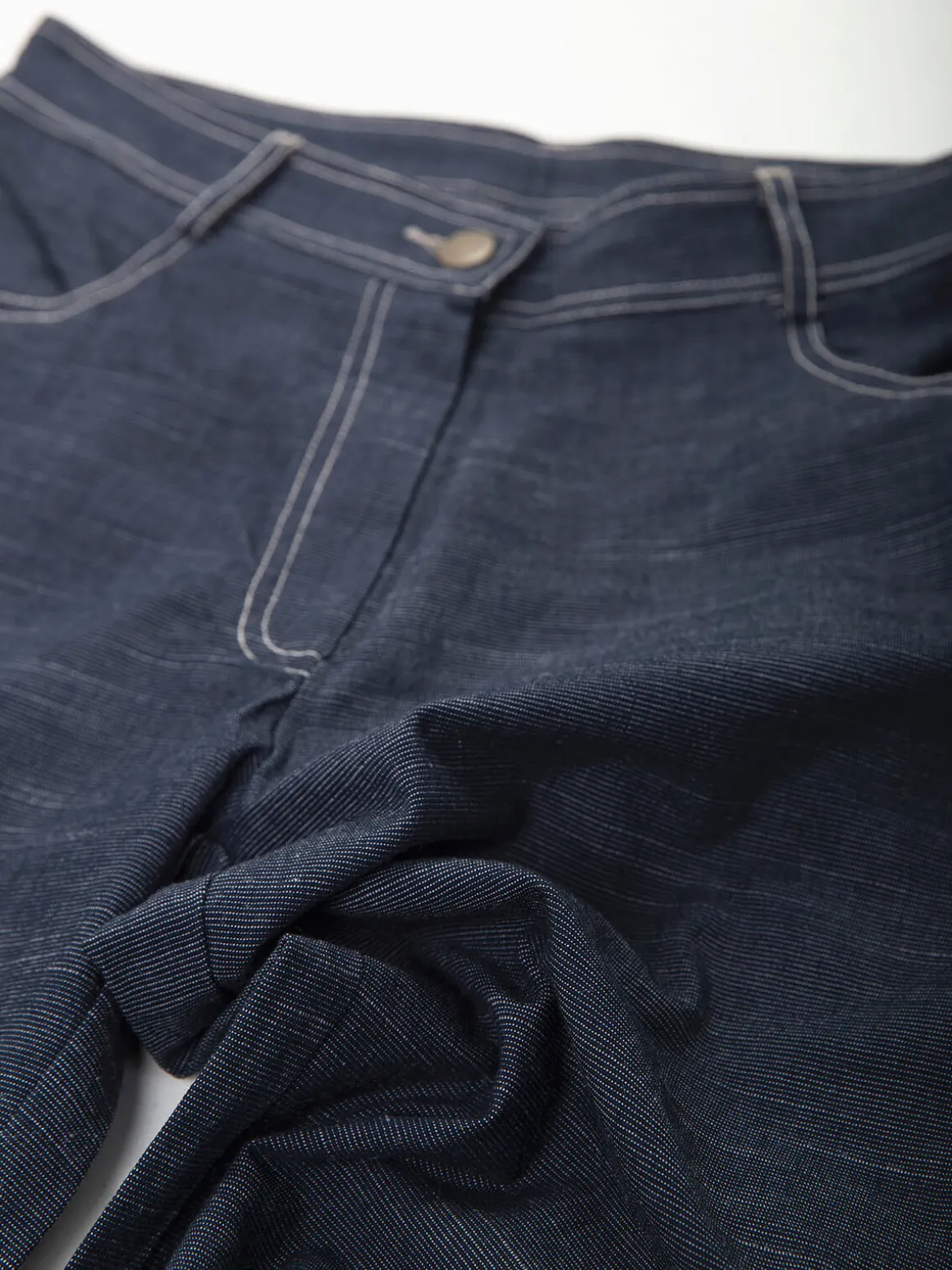 Calças efeito ganga à boca de sino