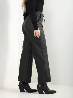 Calças efeito pele cintura elástica