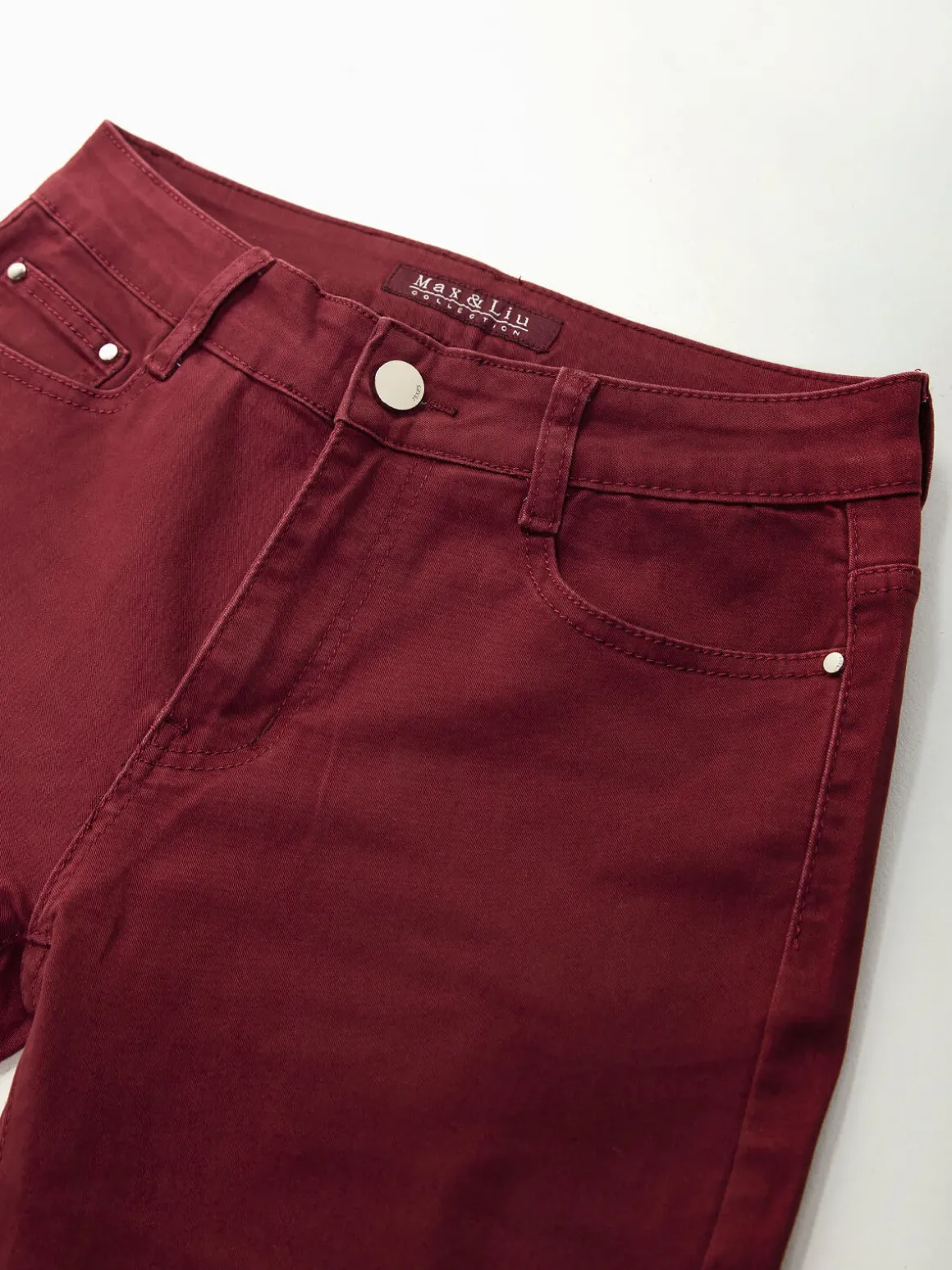 Calças elásticas bordeaux cintura alta