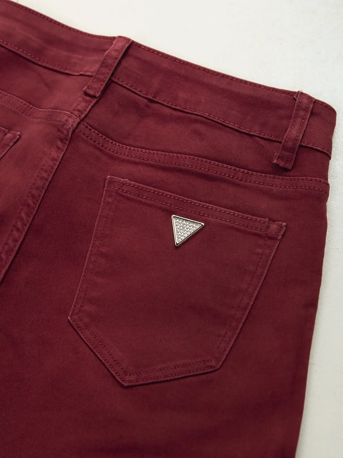 Calças elásticas bordeaux cintura alta