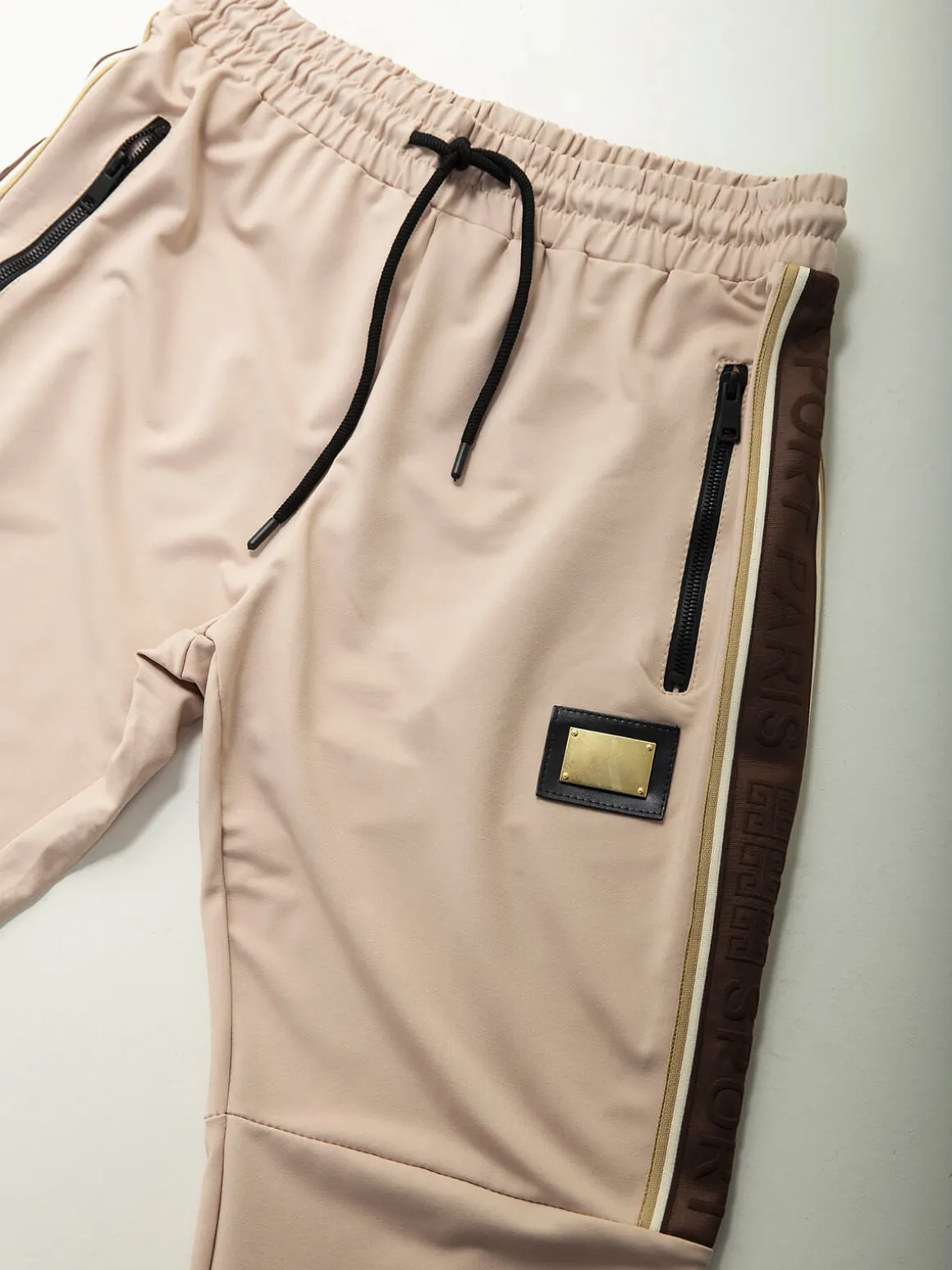 Calças fato treino com aplicação