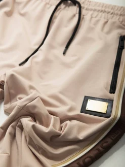 Calças fato treino com aplicação