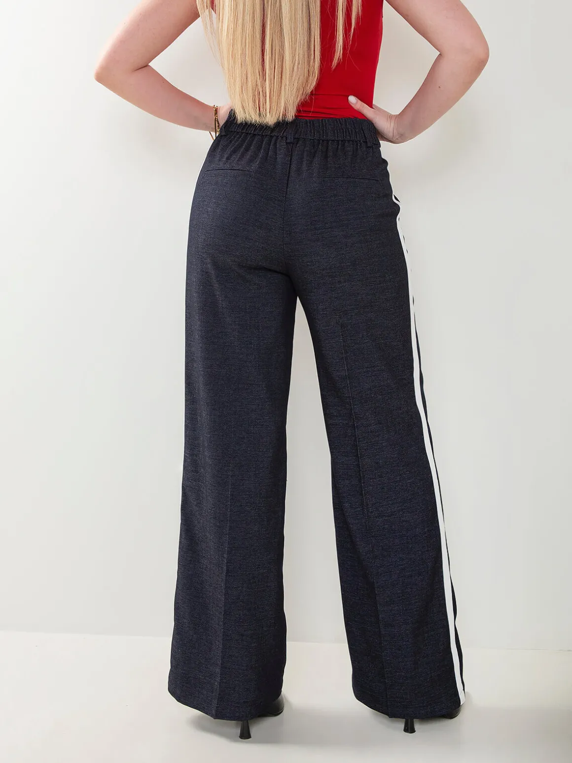 Calças fluídas azul marinho