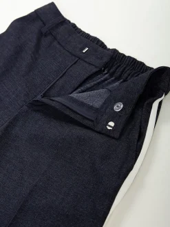 Calças fluídas azul marinho