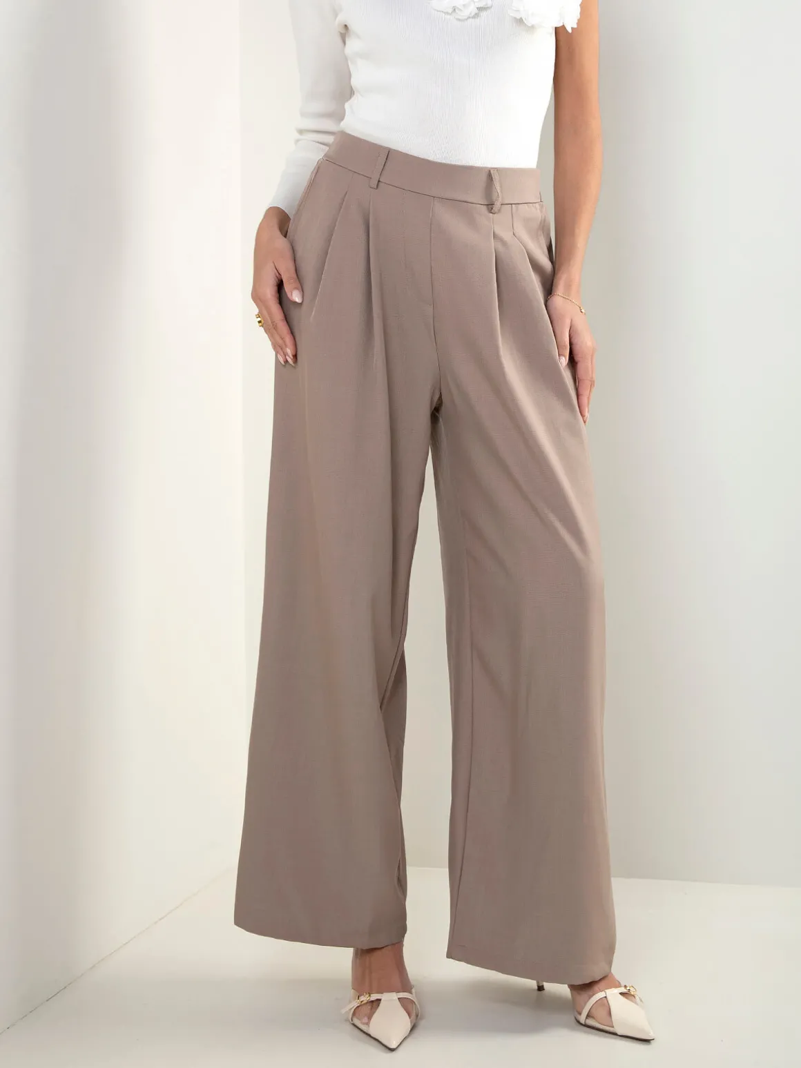 Calças fluídas cintura alta