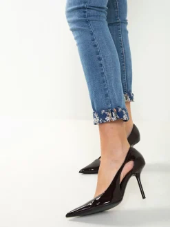 Calças ganga justas com bordados