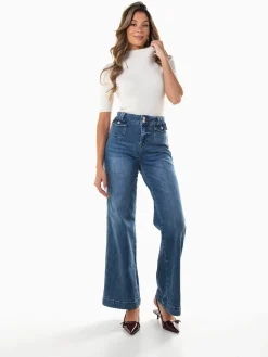 Calças ganga largas com bolsos