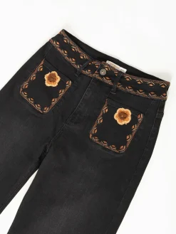 Calças ganga straight fit bolsos com crochet