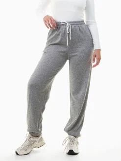 Calças jogger em malha canelada