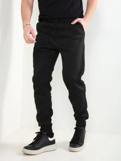 Calças jogger pretas com estampado