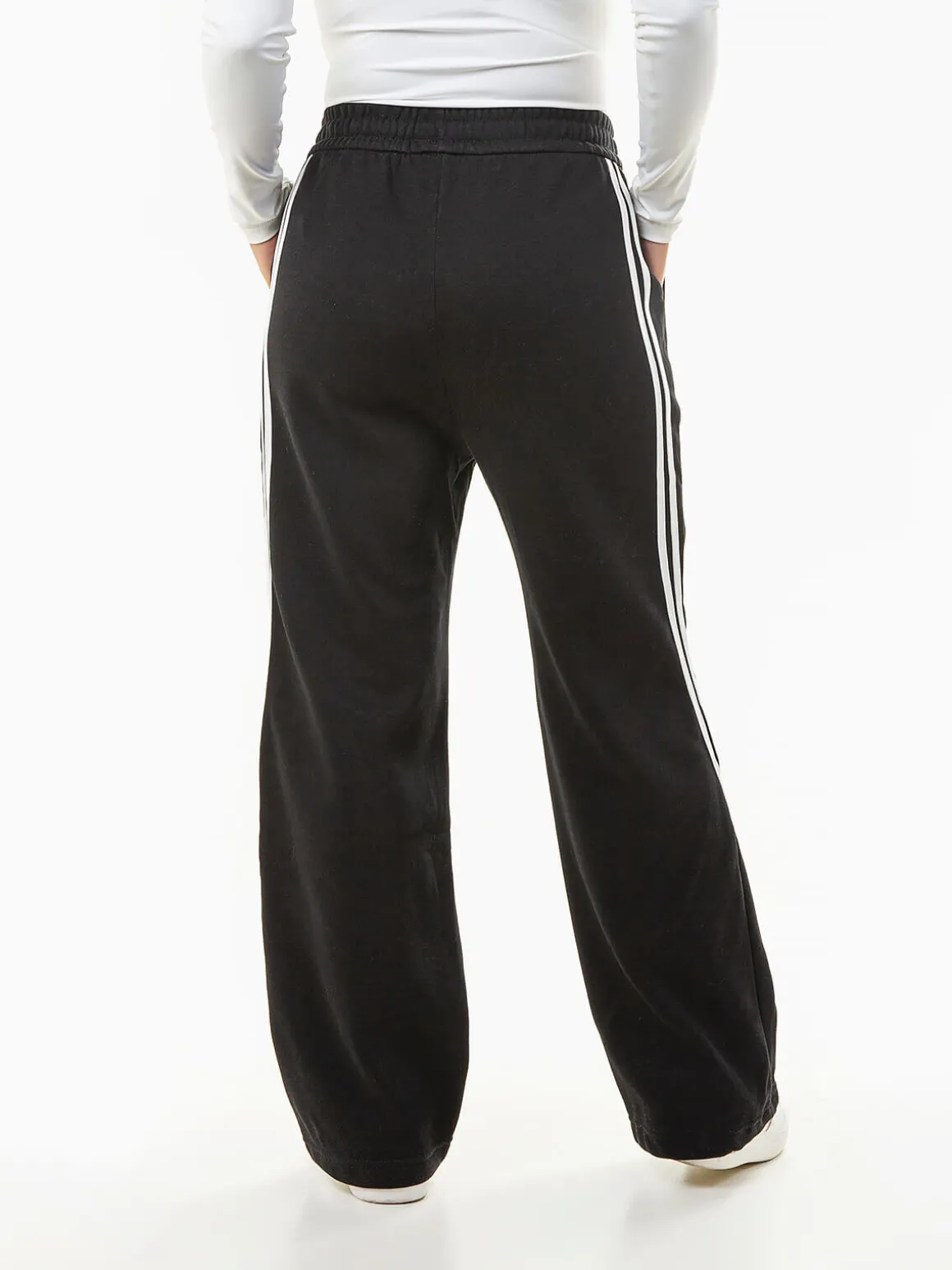 Calças largas riscas laterais