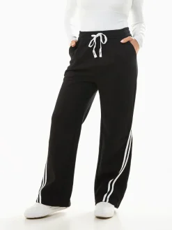 Calças largas riscas laterais