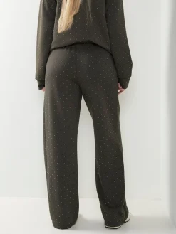 Calças malha com strass