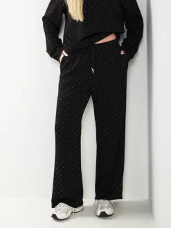 Calças malha com strass