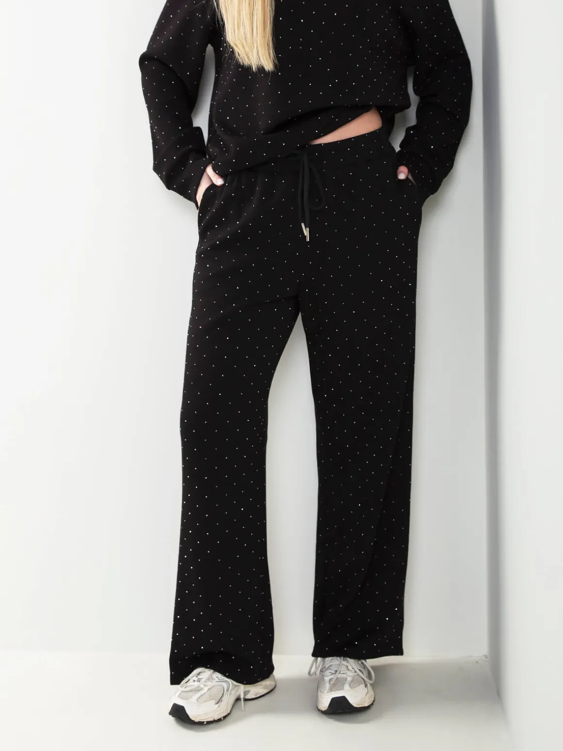 Calças malha com strass