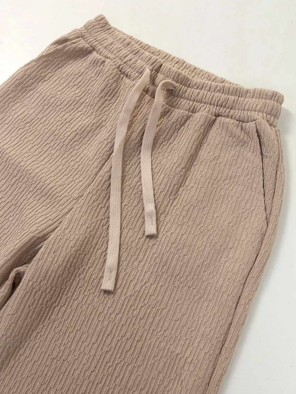 Calças malha com textura