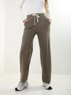 Calças malha efeito aveludado cintura alta