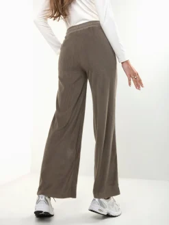 Calças malha efeito aveludado cintura alta