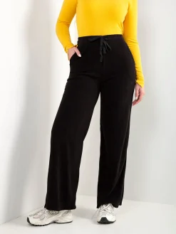 Calças malha efeito aveludado cintura alta