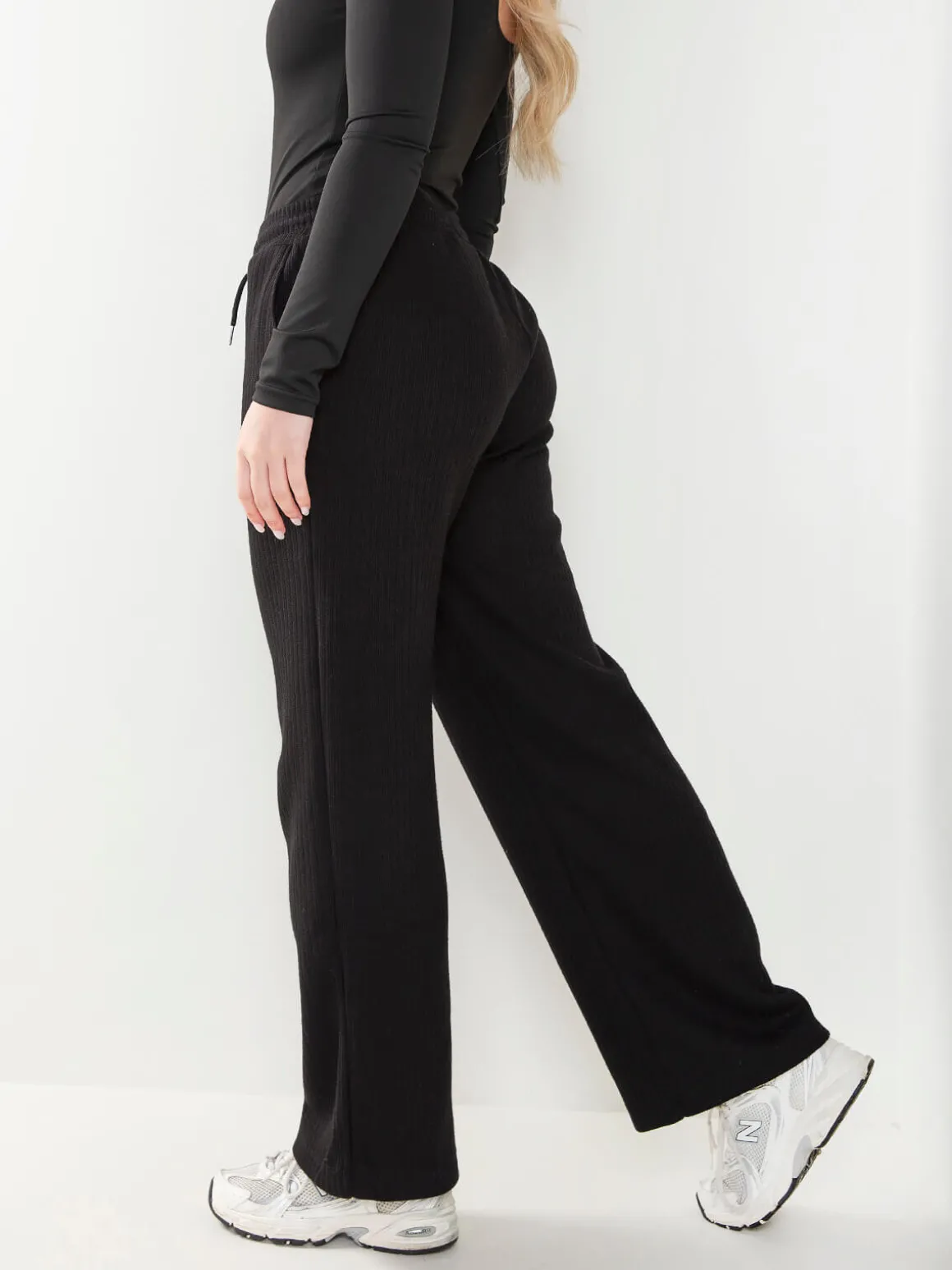 Calças malha largas interior cardado