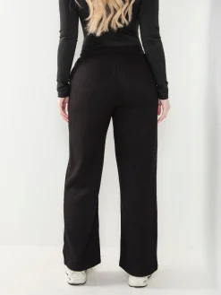 Calças malha largas interior cardado