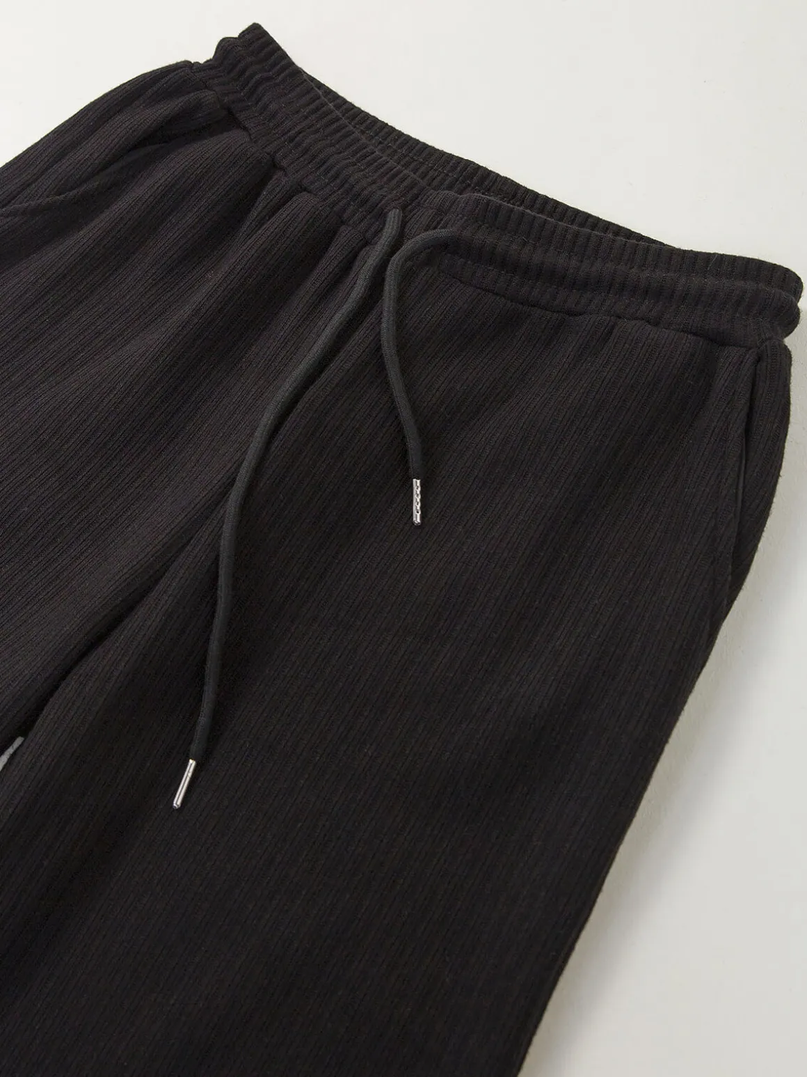 Calças malha largas interior cardado