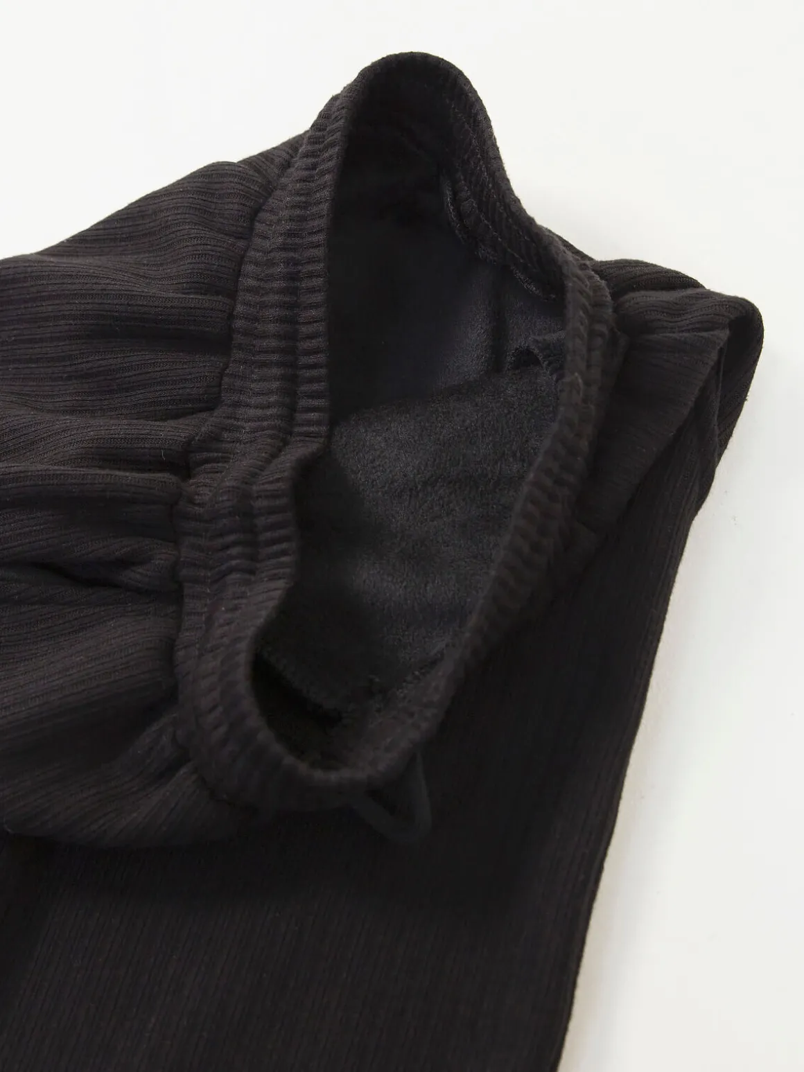 Calças malha largas interior cardado