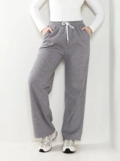 Calças malha largas interior cardado