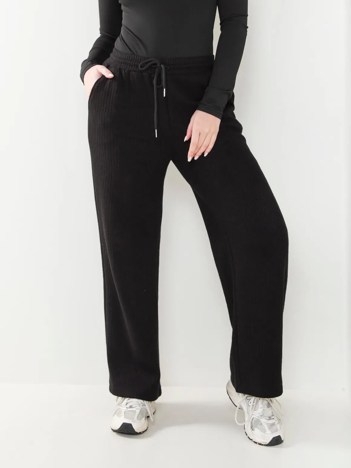 Calças malha largas interior cardado