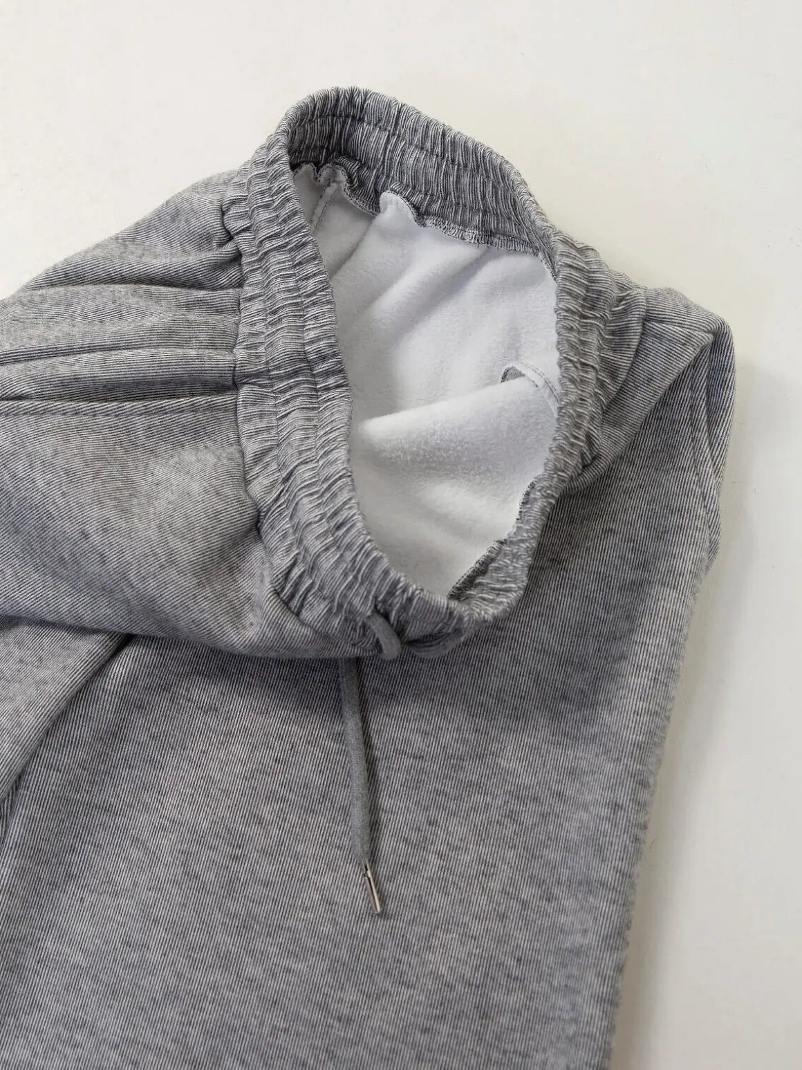 Calças malha nervuras interior polar