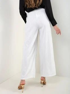 Calças wide leg riscas diplomáticas