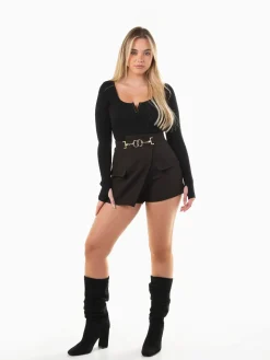 Calções alfaiataria com sobreposição