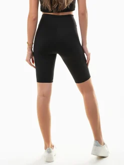 Calções pretos estilo ciclista