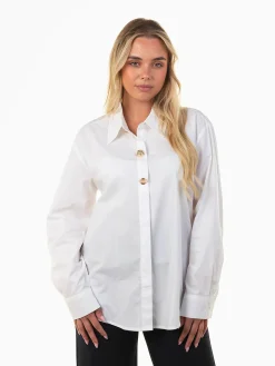 Camisa com botões dourados