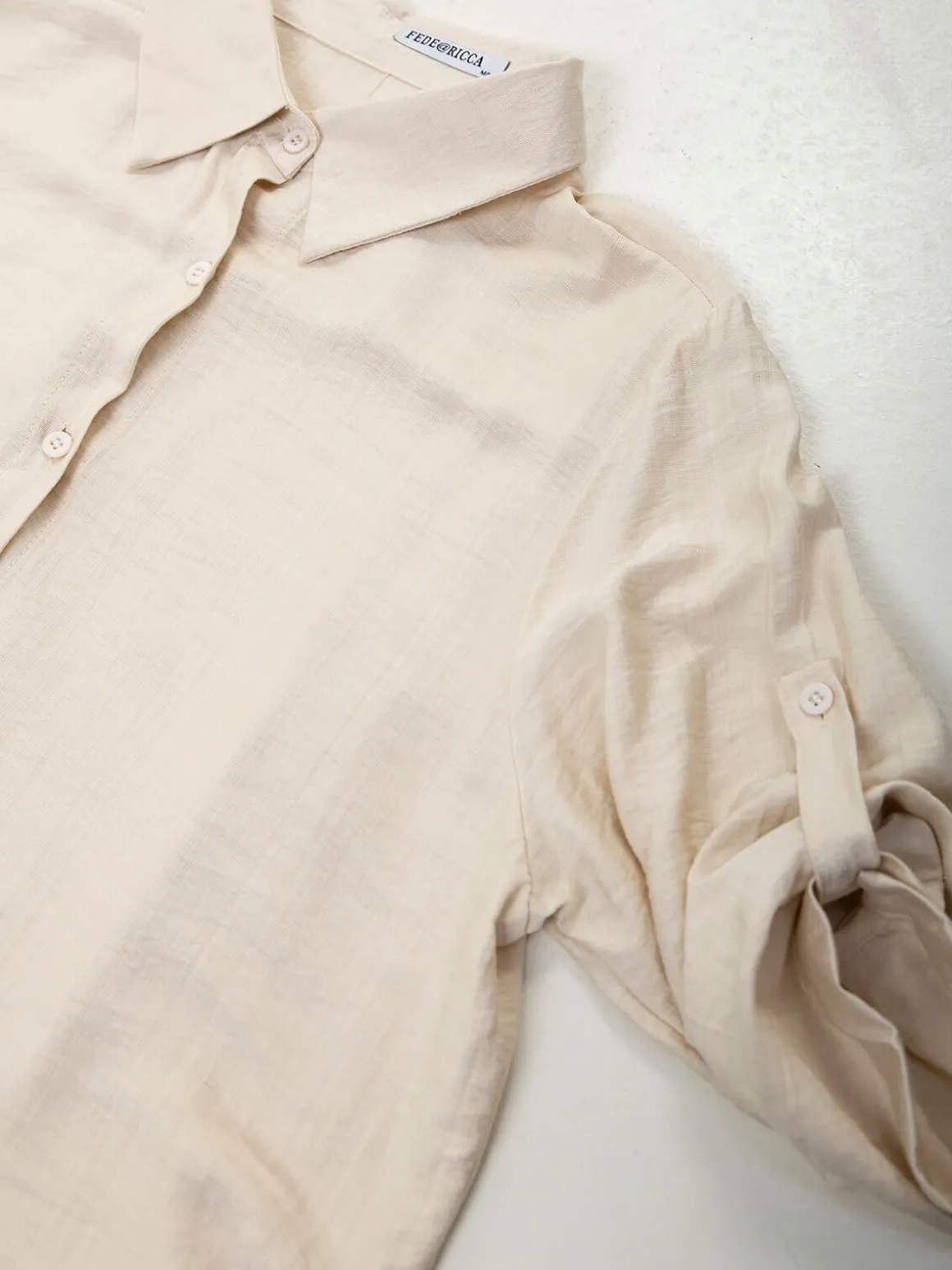 Camisa comprida manga 3/4