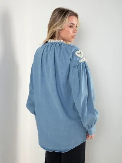 Camisa ganga com pérolas e manga balão