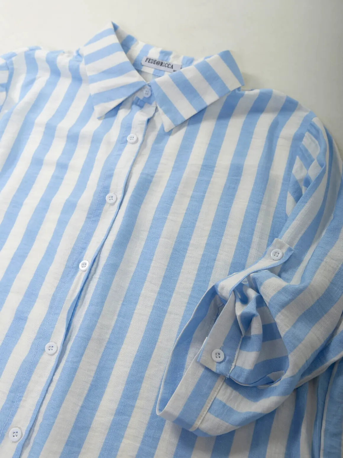 Camisa às riscas manga 3/4